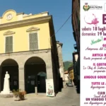 piazza centrale di bagnone e locandina di Bagnone di vino 2026