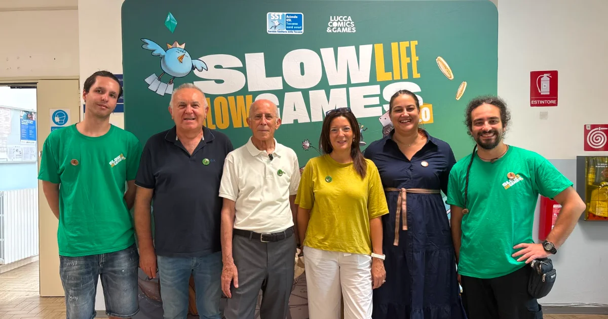 Stand informativo con giochi da tavolo e falsa slot machine all'ospedale di Pontremoli per la prevenzione del gioco d'azzardo